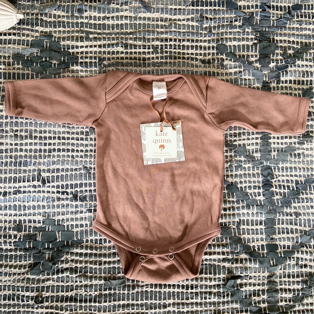 NWT Kate Quinn NB onesie